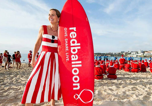 redballoon promotional branded surfboard red